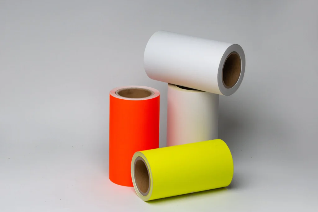 High brightness fluorescent self-adhesive paper label material